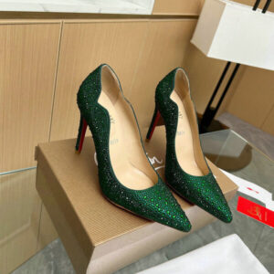 Stylish green suede pumps with wavy design, perfect as Louboutin-inspired footwear.